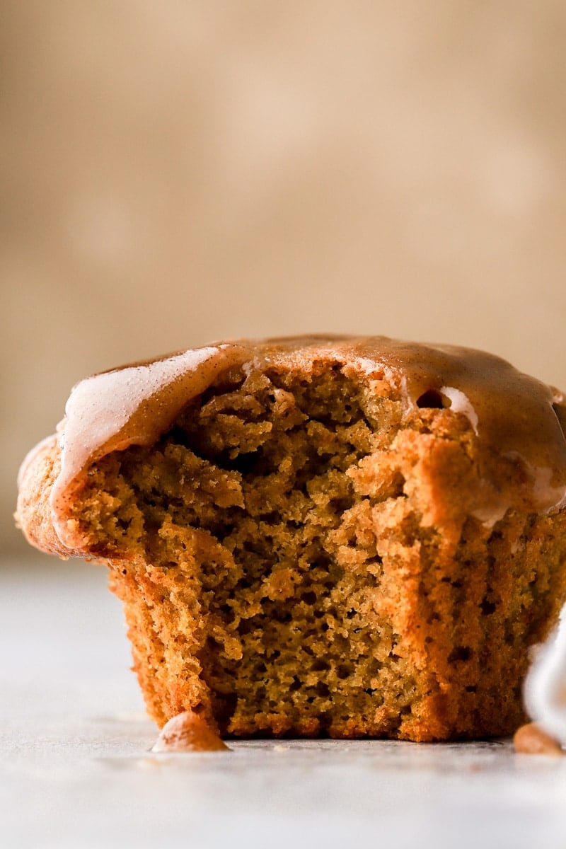 close up of a pumpkin banana muffin with bite taken out