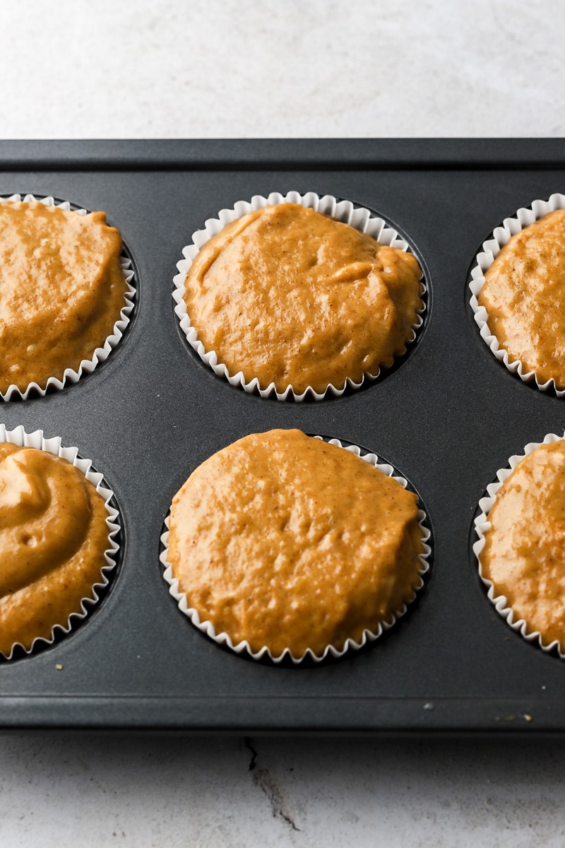 muffins tins filled with batter