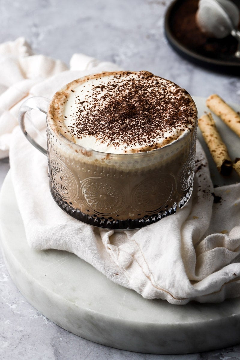 latte with cocoa powder, sweetened vanilla milk and topped with mascarpone cream and dusting of cocoa powder
