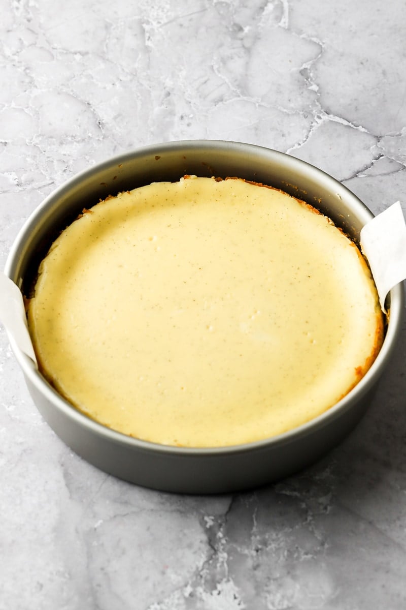 vanilla cheesecake batter in pan, baked