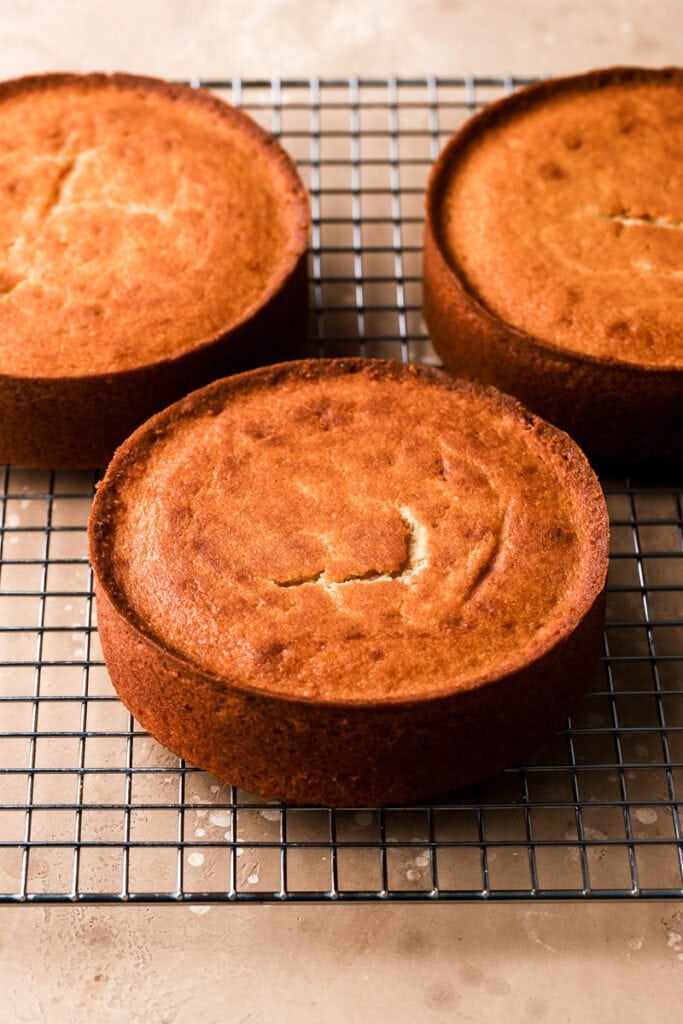 brown butter cakes baked cooling on a rack