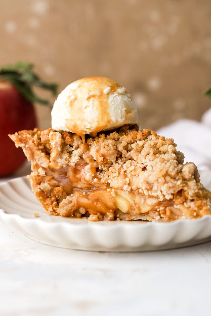 slice of apple pie with ice cream and caramel
