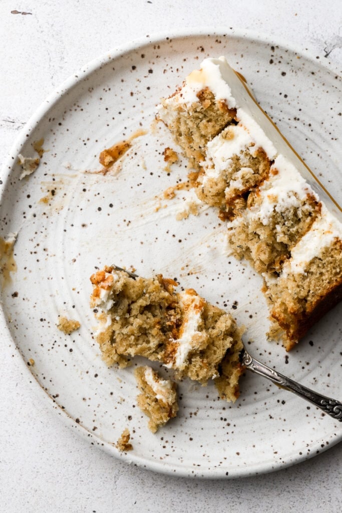 slice of banoffee cake on a plate with most of it eaten