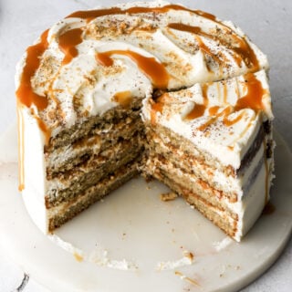 banoffee cake on marble board with slices cut