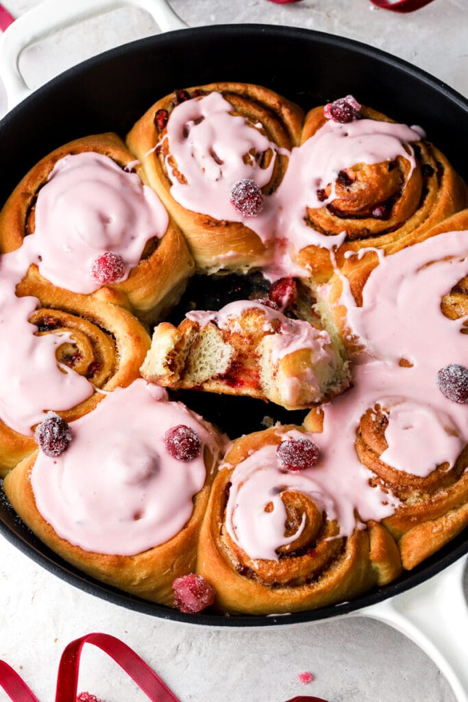 cranberry cinnamon rolls with a bite taken out