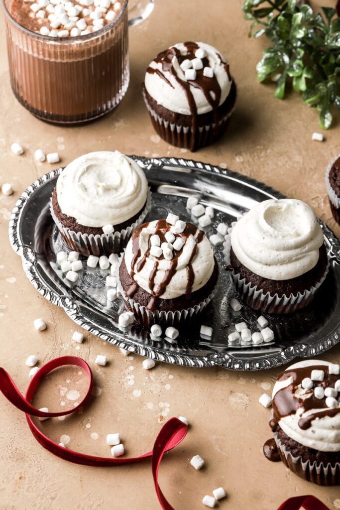 frosted cupcakes with hot chocolate sauce