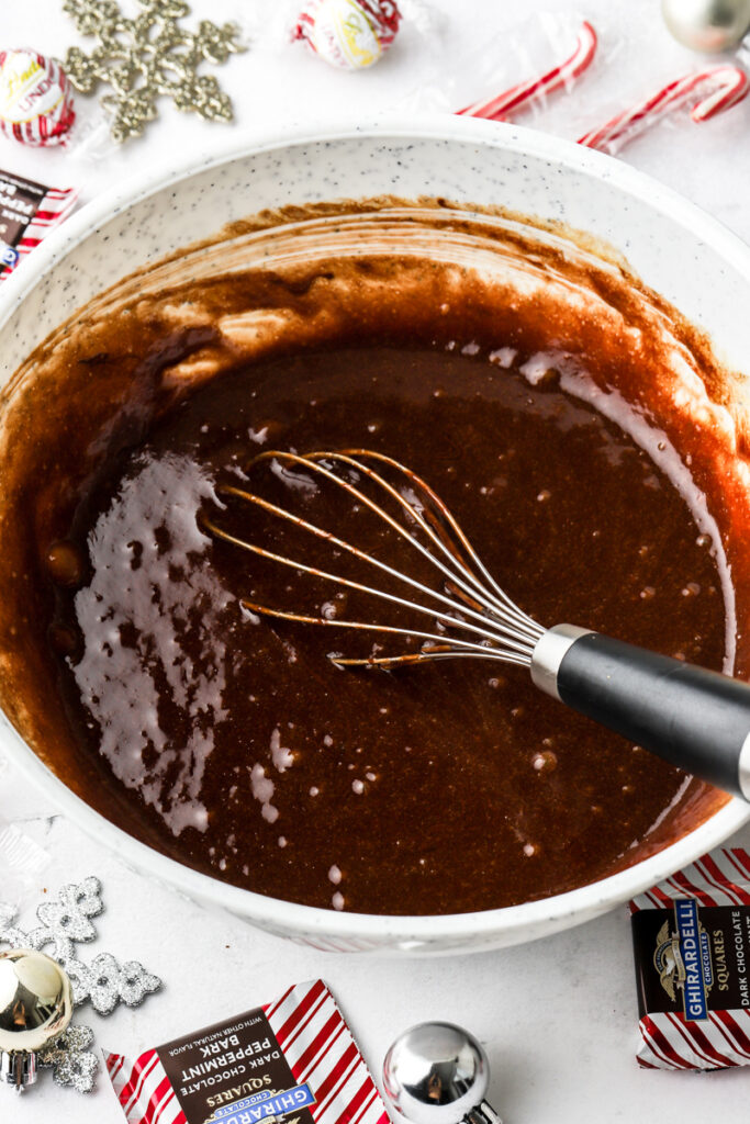 whisk the eggs and sugar with the melted butter and chocolate