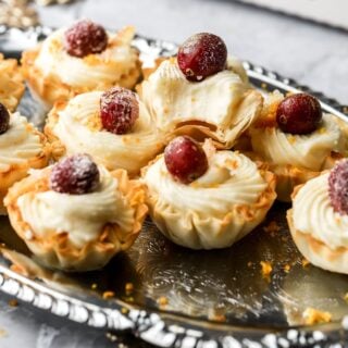 mini white chocolate cranberry cheesecakes