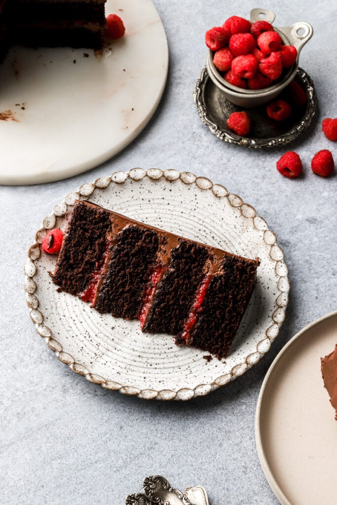 slice of chocolate raspberry cake on a plate