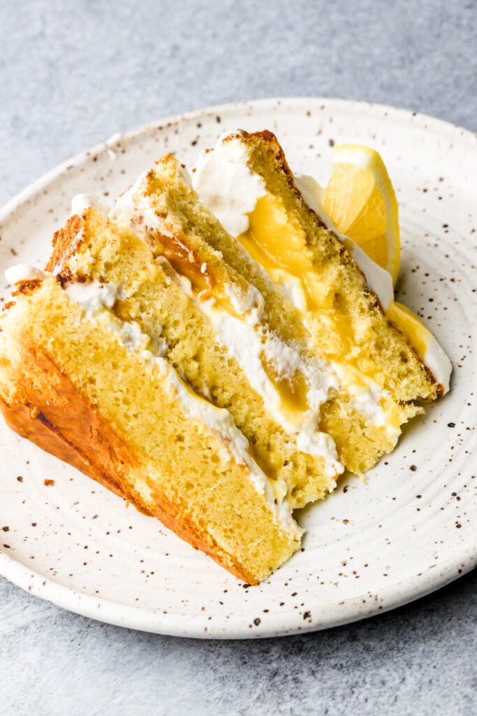 molly cake layered with whipped cream and lemon curd