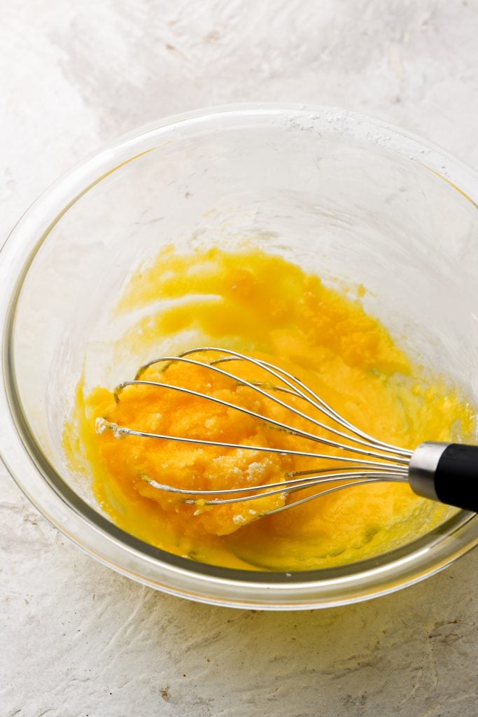 egg yolks whisked with sugar and cornstarch, still clumpy