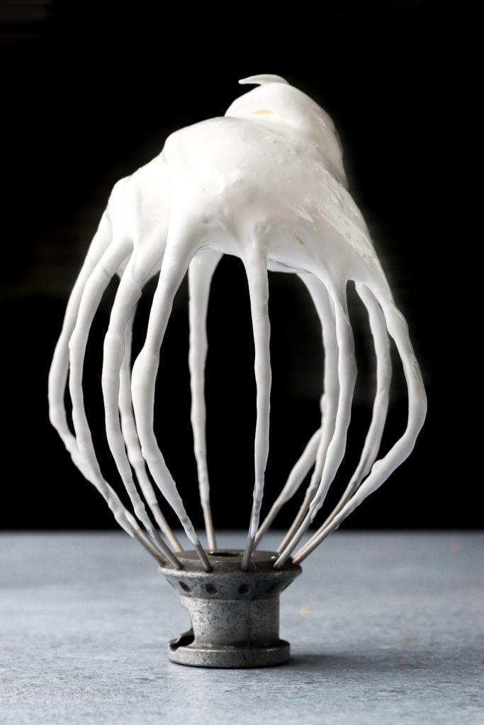meringue whipped to soft peaks on whisk