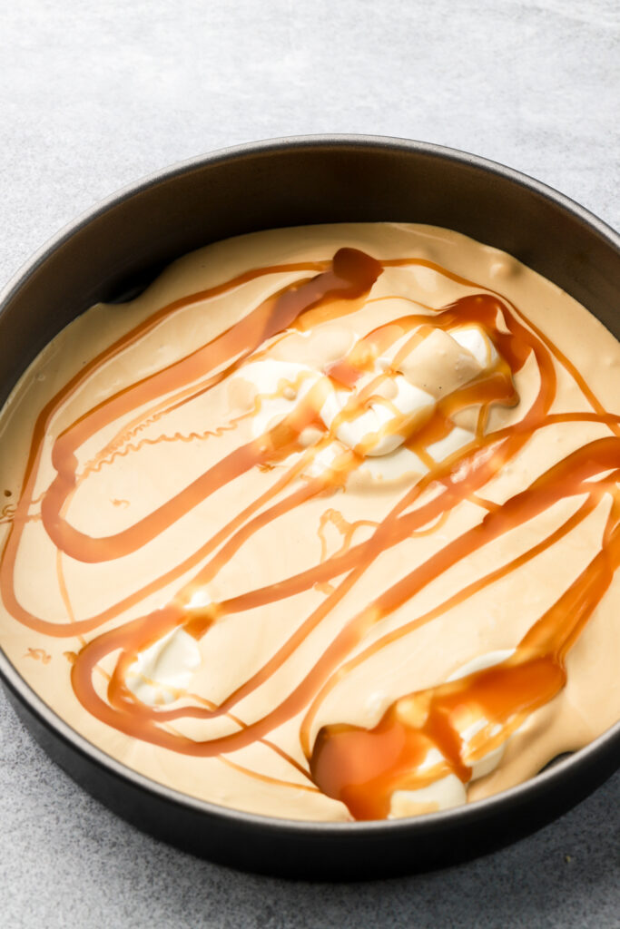 vanilla and coffee ice cream with caramel sauce drizzled