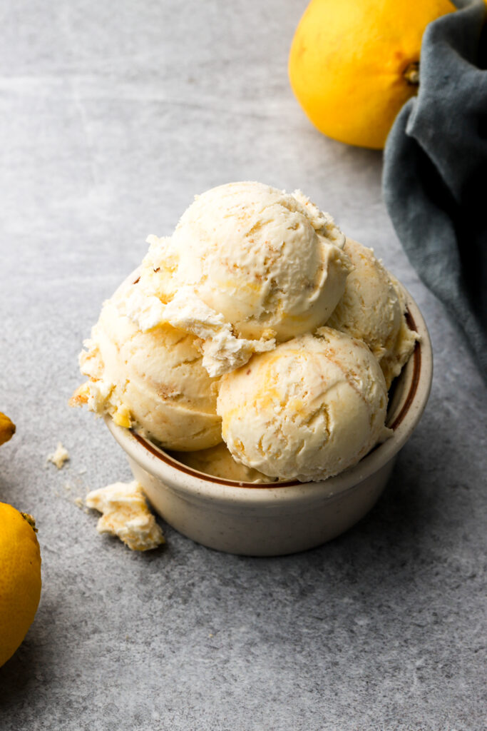 brown butter lemon ice cream scoops in a small bowl