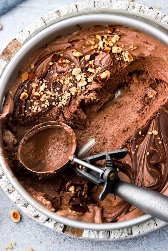 nutella ice cream topped with hazelnuts 