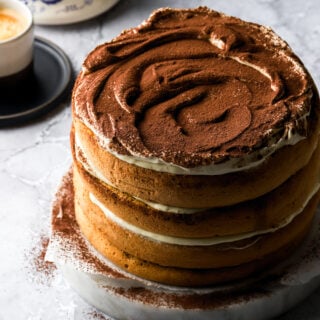 tiramisu cake with coffee and tea pot