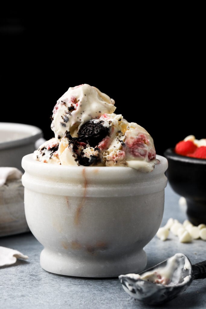 white chocolate raspberry ice cream in a bowl