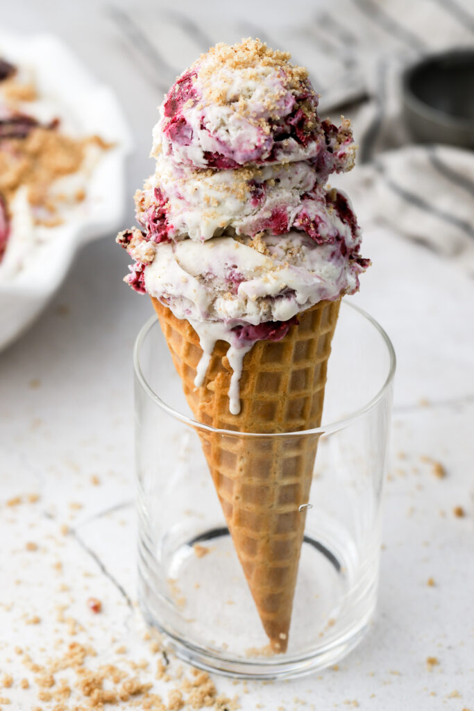 berry streusel ice cream in a cone in a cup