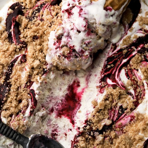 berry streusel ice cream with a cone in the pan