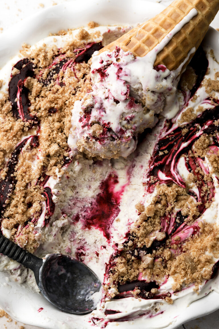 berry streusel ice cream with a cone in the pan