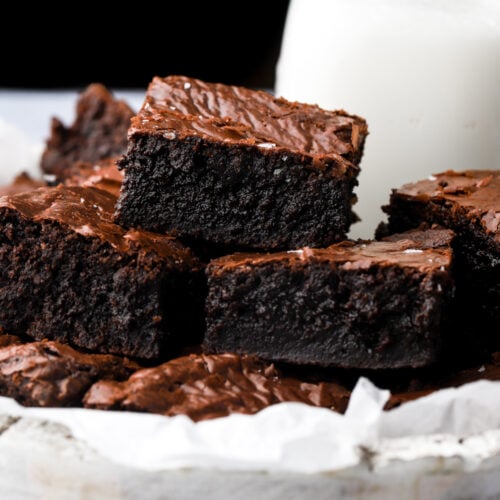 brown butter brownies stacked with milk