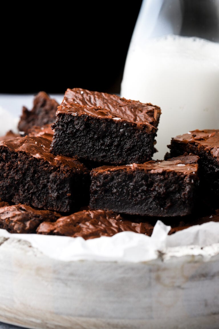 brown butter brownies stacked with milk