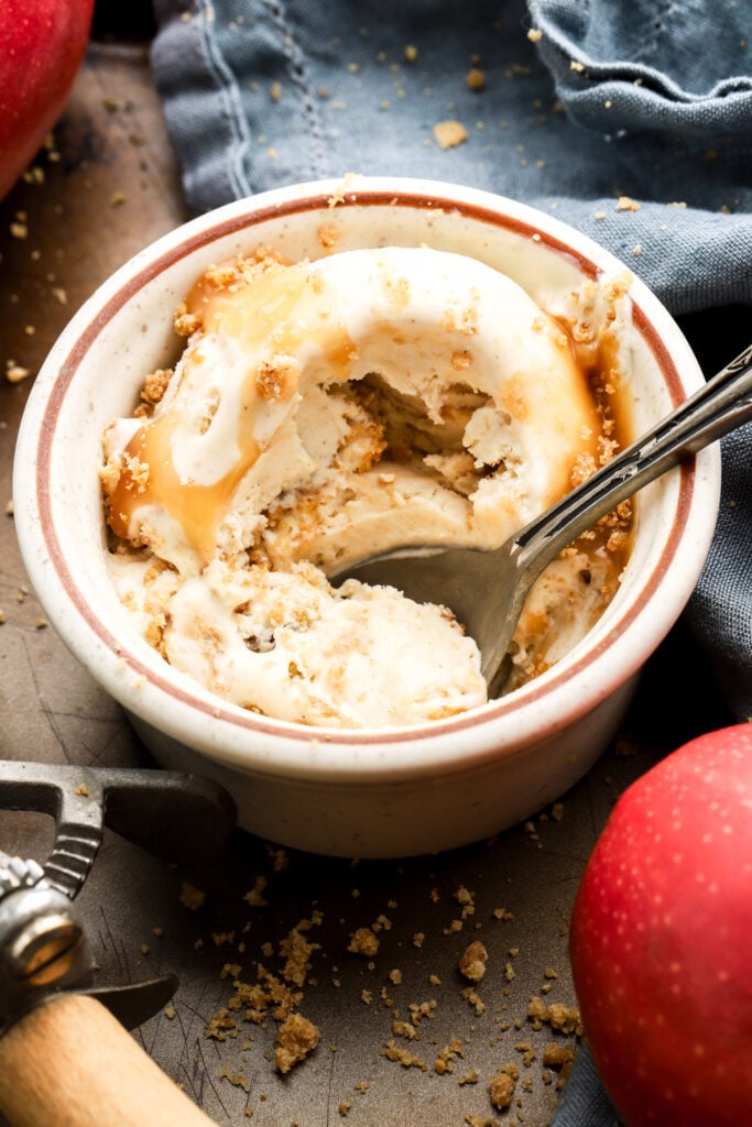 apple ice cream in a small bowl with a spoon