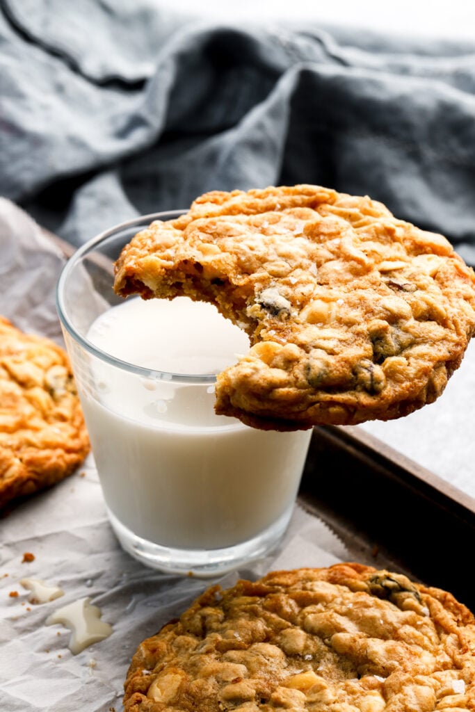 oatmeal cookie on a glass milk 