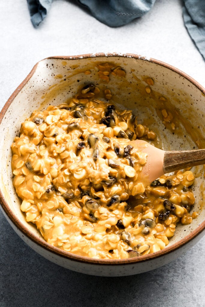 raisins and white chocolate folded into cookie dough