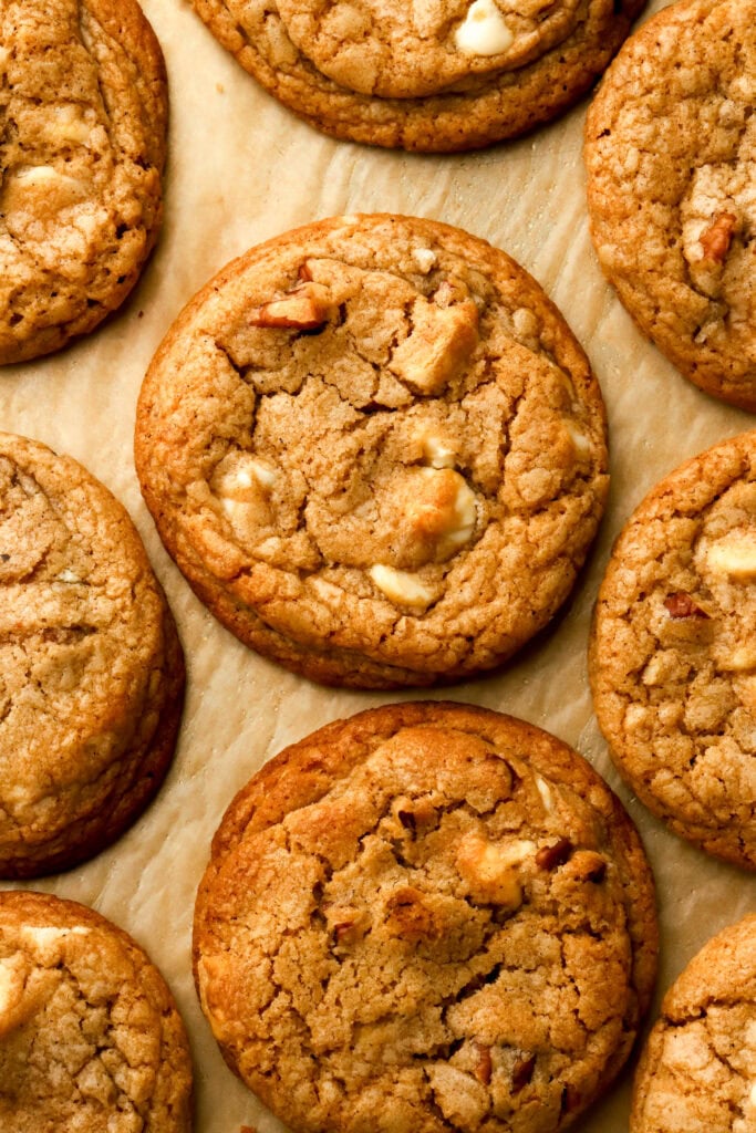 chai cookies finished baking on pan with brown parchment paper