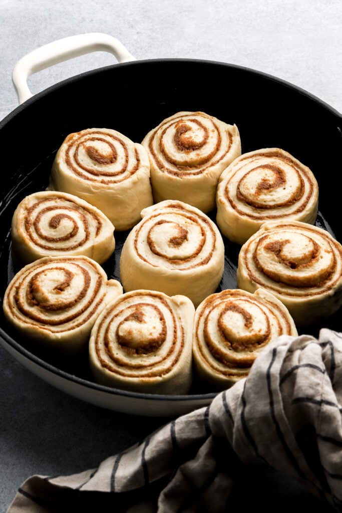 cinnamon rolls finished proofing in pan