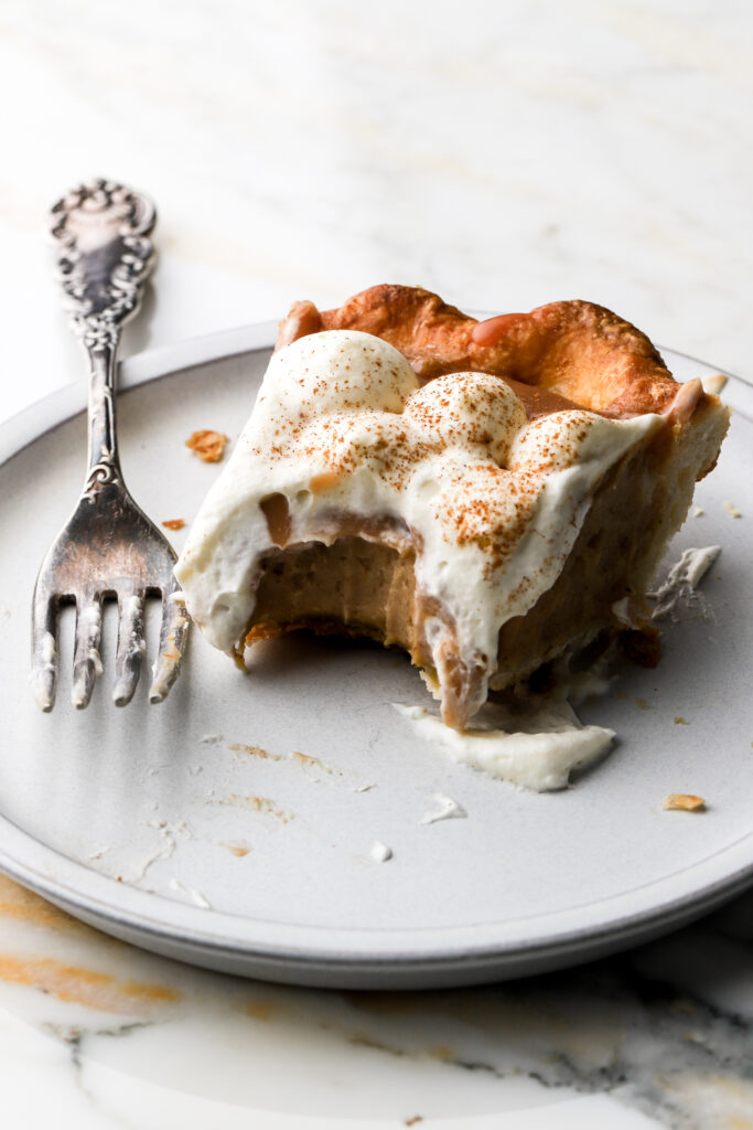 slice of apple cream pie on a plate