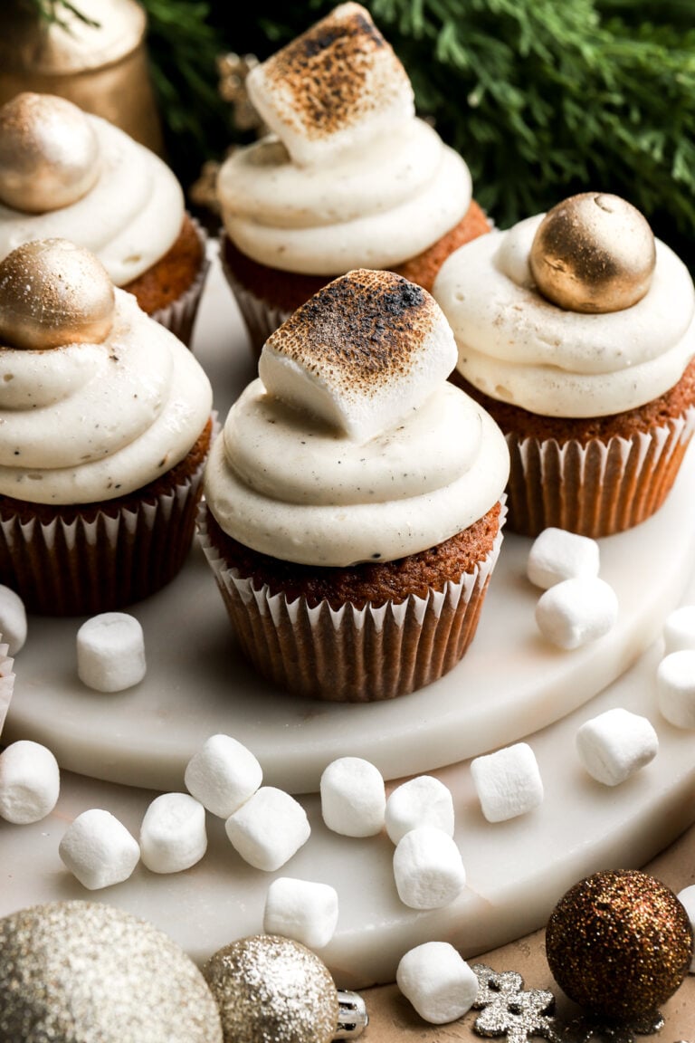 gingerbread cupcakes frosted with toasted marshmallow cream cheese frosting