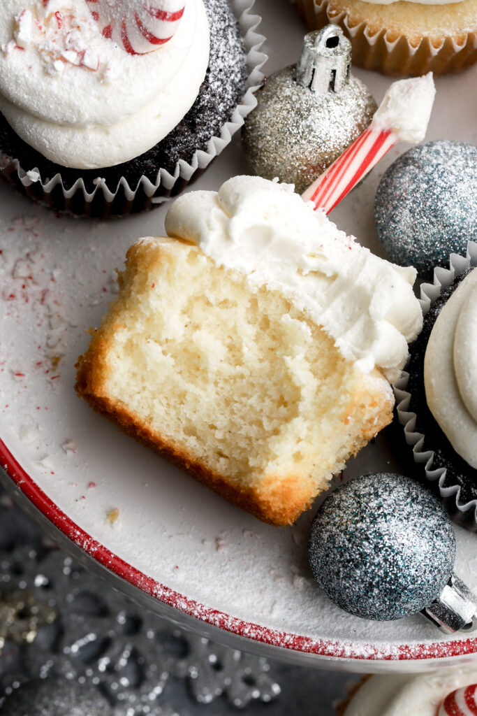 close up of white cupcakes with peppermint frosting