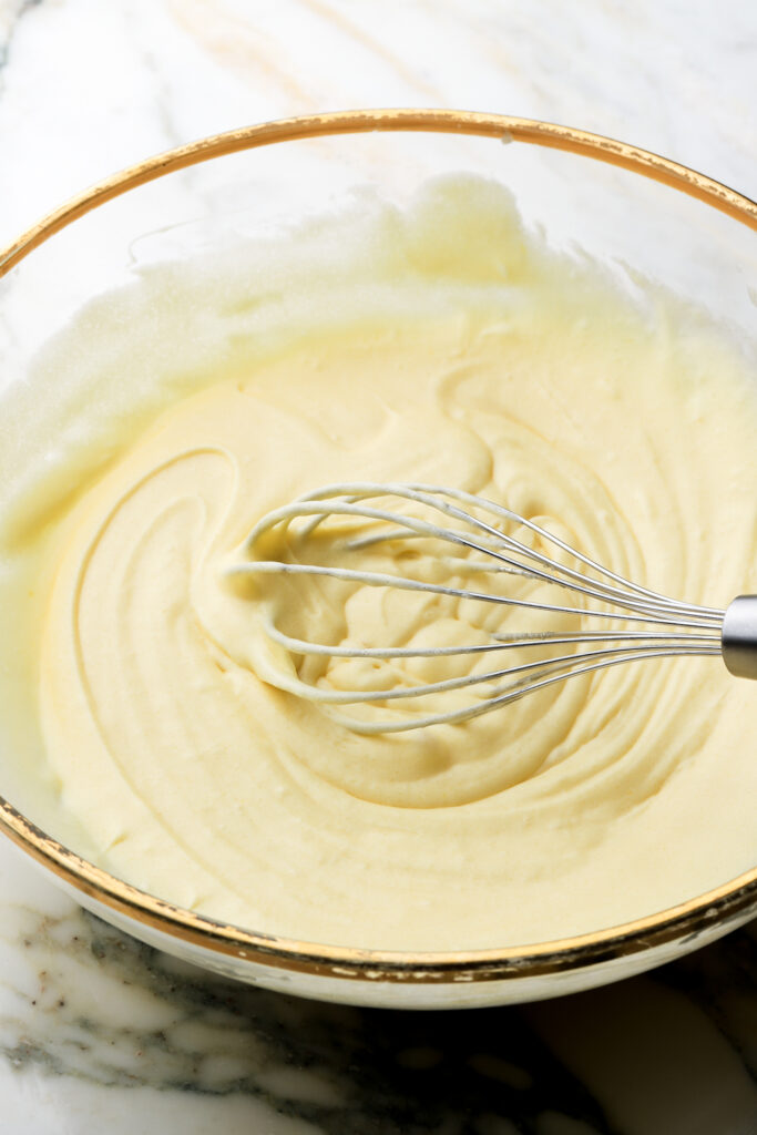 eggs whisked into the butter and sugar
