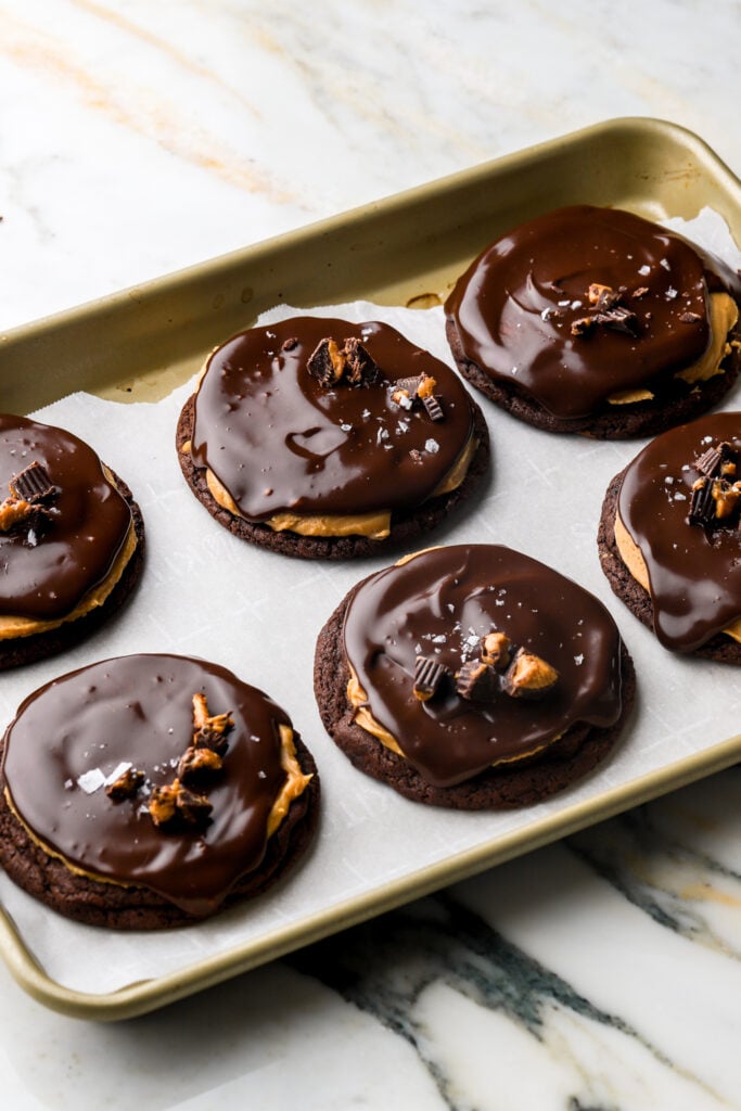 cookies topped with chocolate ganache  