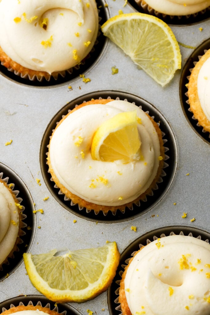 close up of a lemon cupcake with cream cheese frosting