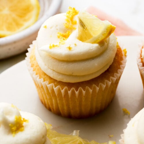 lemon cupcakes frosted with cream cheese frosting