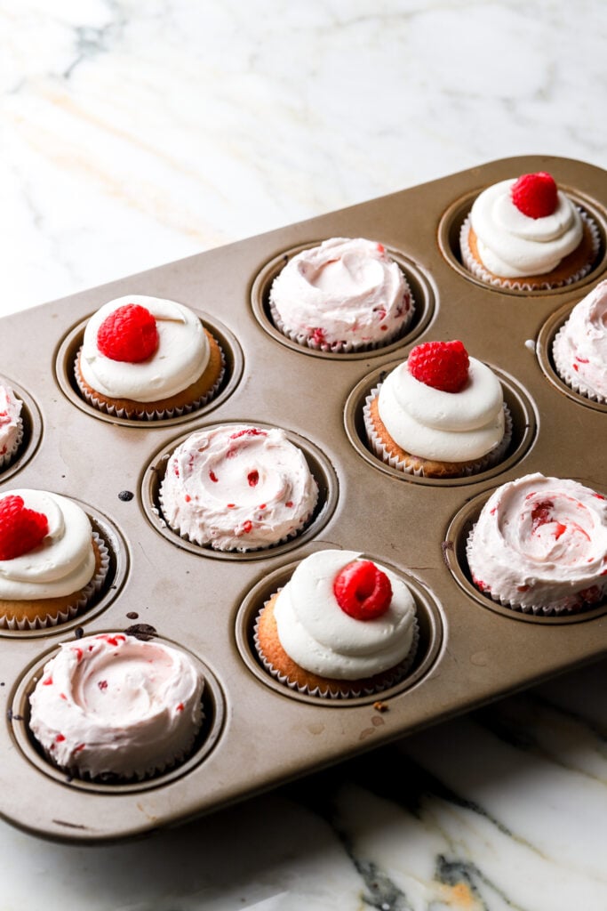 white chocolate raspberry cupcakes frosted