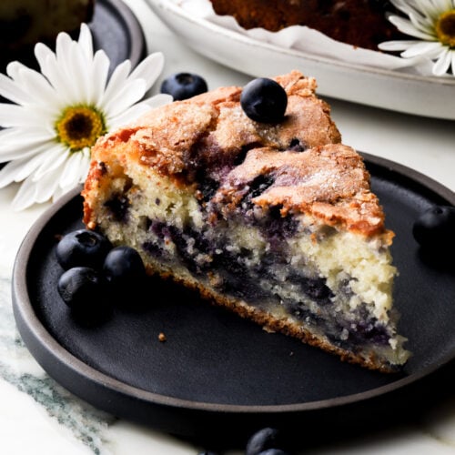 slice of blueberry muffin cake on a plate