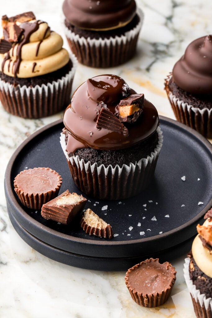 reese's peanut butter cupcakes topped with chopped peanut butter cups