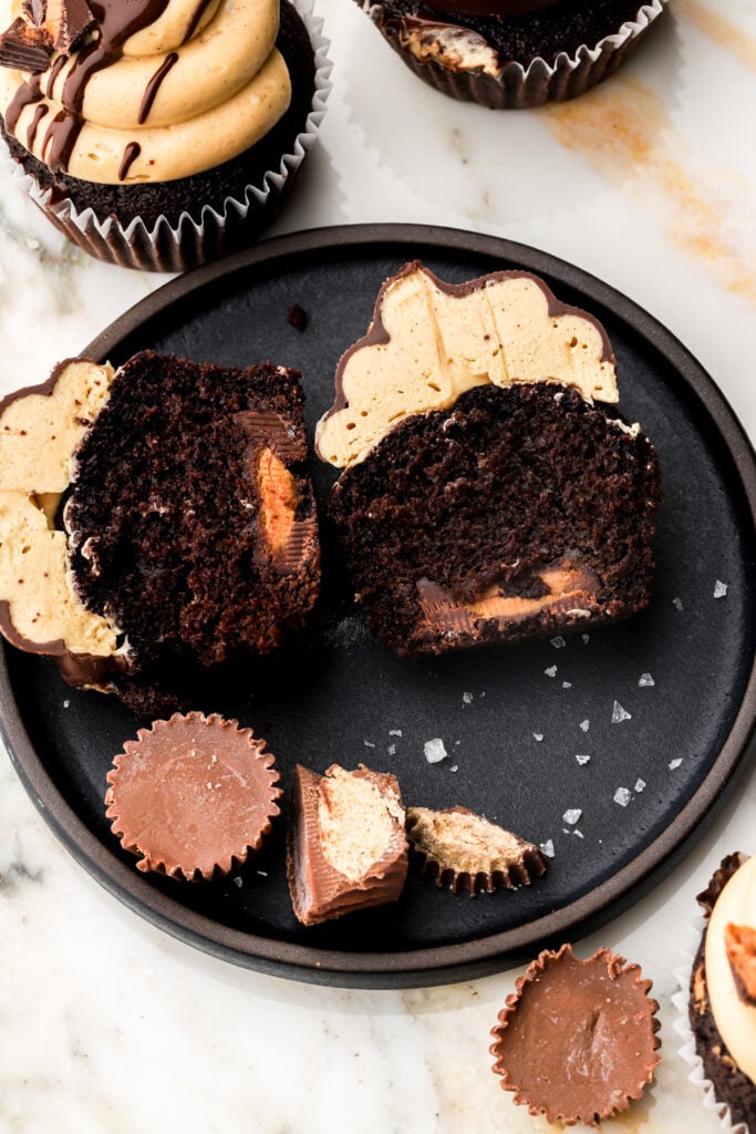 chocolate peanut butter cupcakes sliced in half
