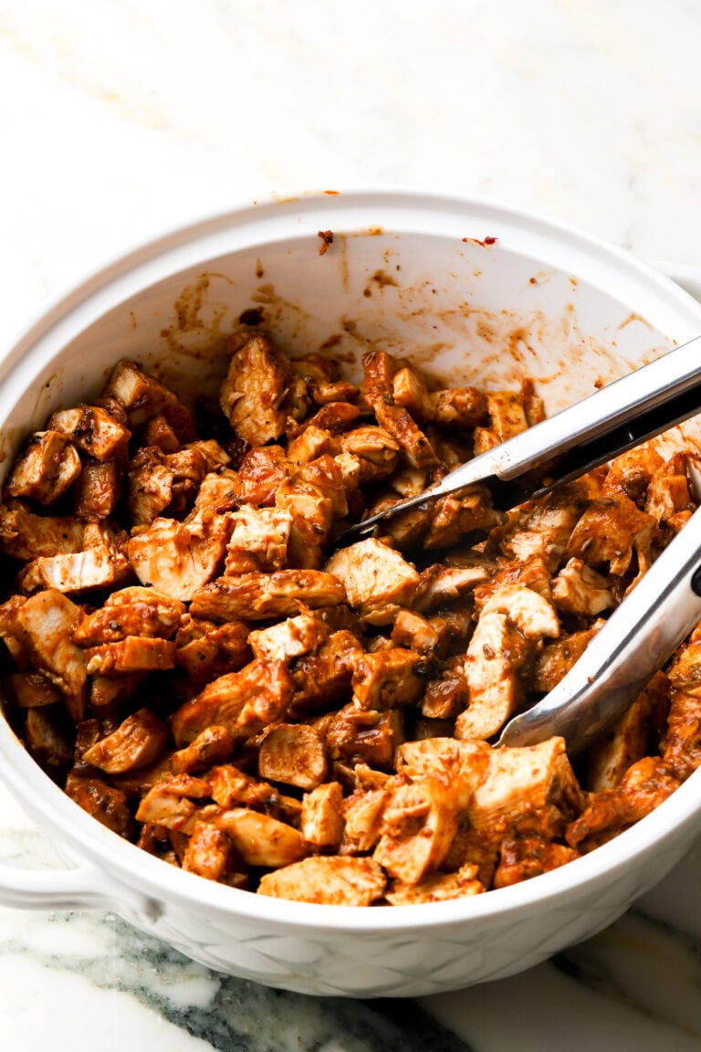 bbq chicken cut up in a large bowl