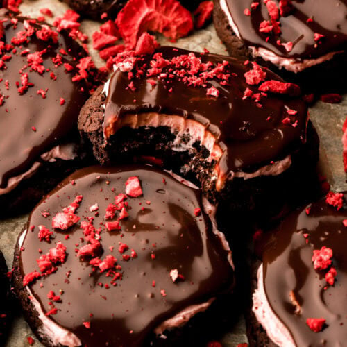 strawberry chocolate cookies with a bite taken out