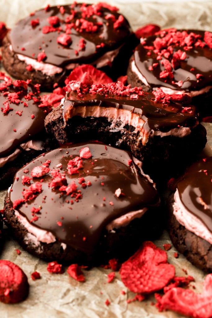 strawberry chocolate cookies with a bite taken out