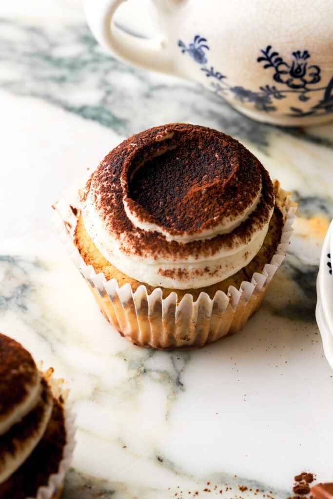 tiramisu cupcake topped with cocoa powder