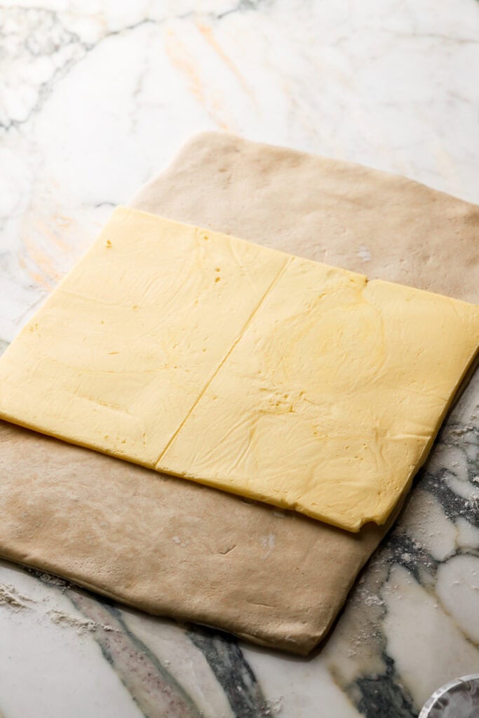 butter placed on top of dough for laminating