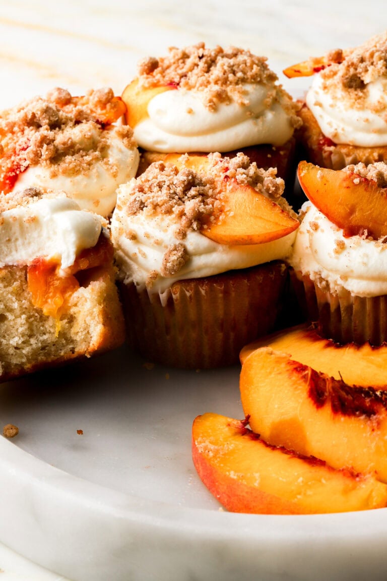 Peach cobbler cupcakes topped with streusel