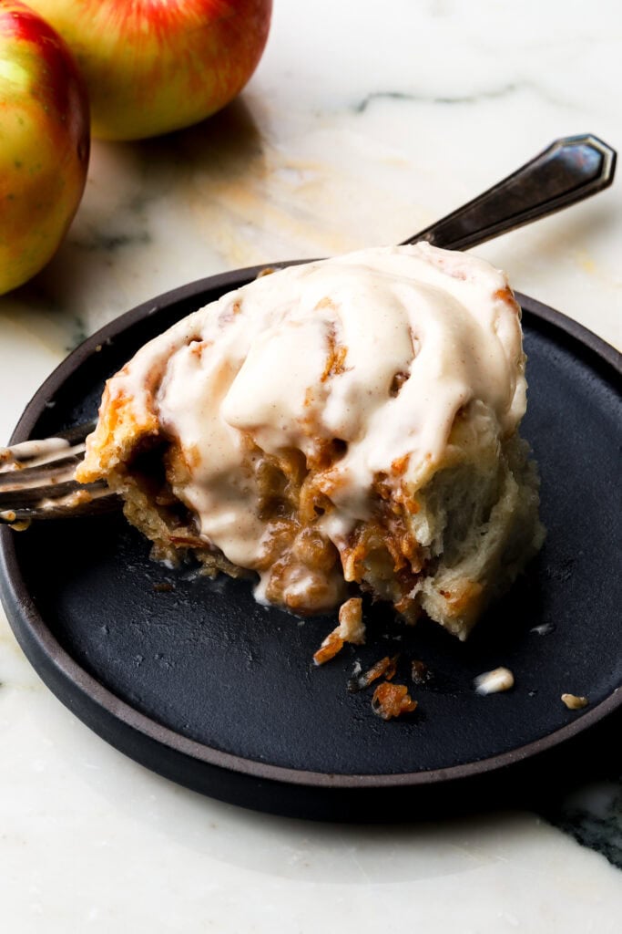 apple cinnamon roll with a bite taken out