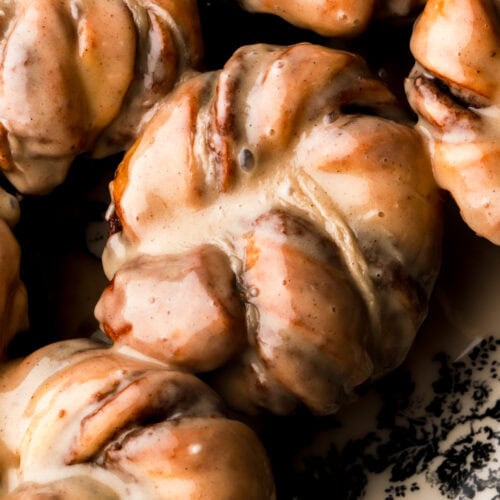 close up of cinnamon knots covered in honey glaze